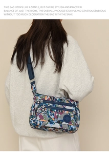 Rear view of a model wearing the multi-compartment printed oxford crossbody bag in casual style