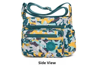 Side view of multi-pocket nylon crossbody bag with camouflage print and adjustable strap
