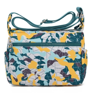 Waterproof oxford crossbody bag with colorful abstract pattern and adjustable strap