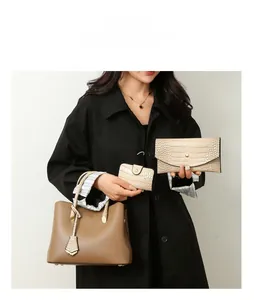 Three-piece tote bag set with wallet and card holder in brown and cream textured leather