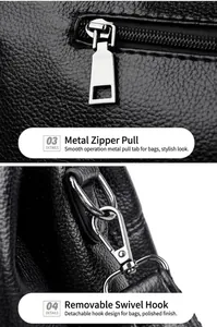 Close-up of black litchi pattern leather with polished silver metal zipper and snap hooks