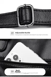 Detail of black pebbled leather handbag with adjustable silver metal buckle and strap