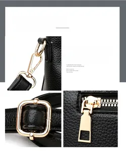 Close-up of golden hardware details and lychee grain leather on black handbag