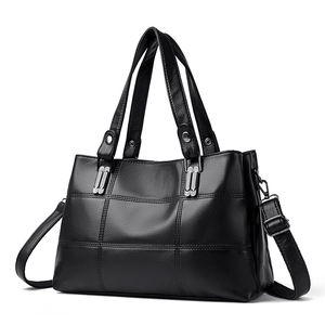 Classic black PU leather tote bag with quilted stitch pattern and silver hardware