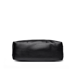Minimalist black PU leather shoulder bag featuring classic litchi grain texture