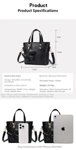 Detailed size specifications for the black quilted crossbody bucket bag with dog pendant
