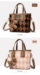 Detailed view of diamond quilted bucket bags with bear pendants in pink and yellow brown
