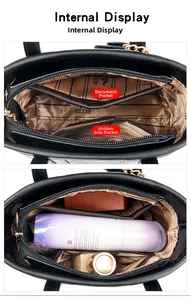 Internal view of black leather bucket bag showing compartments and striped lining