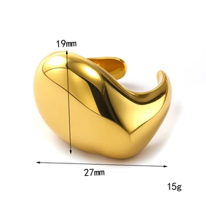 Irregular 18k gold geometric open ring with polished organic silhouette and wide design