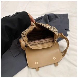 Leopard print crossbody bag interior view showing large capacity and zipper pocket