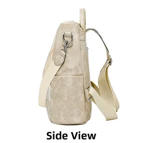 Side view detail of beige quilted PU leather backpack with adjustable straps and metal D-ring
