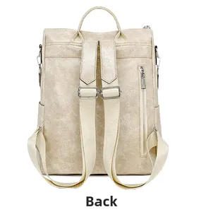 Detail of soft cream PU leather backpack featuring a secure vertical back zipper pocket