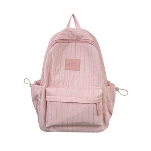 Pink preppy bubble texture backpack for students featuring drawstring side pockets
