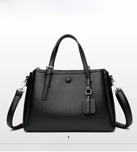 Front view of black lychee grain tote bag with top handle and detachable strap details