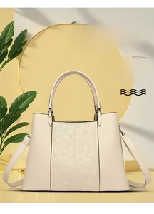 Detailed relief flower pattern on cream cowhide leather tote bag with silk scarf