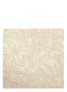 Macro detail of high-quality embroidery on premium wear-resistant beige faux leather fabric