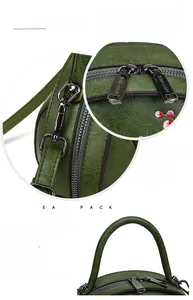 Detail of vintage embroidered floral bag with high-quality metal hardware and zippers
