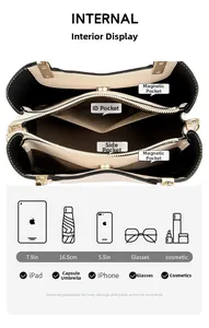 Detail view of embroidered handbag interior with compartments for iPad and makeup
