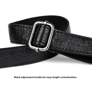 Detail of adjustable silver buckle on black pebbled leather strap for shoulder bag