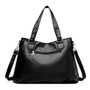 Classic black pebbled leather crossbody handbag for women with silver hardware and back pocket