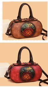 Close-up of vintage leather cylindrical handbags with 3D embossed peony floral patterns