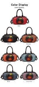 Detailed view of vintage embossed leather cylinder bags in various vibrant colors