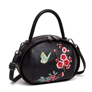 Vintage black handbag with plum blossom embroidery and leather lychee texture