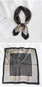Vue détaillée du foulard en soie aux motifs géométriques rétro noir et beige et losanges
