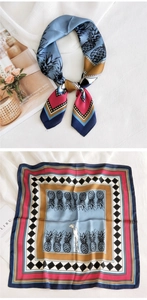 Détail d'un foulard carré en satin avec imprimés ananas et bordures géométriques