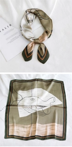 Vue détaillée d'un foulard en soie vert olive avec motifs abstraits et rayures