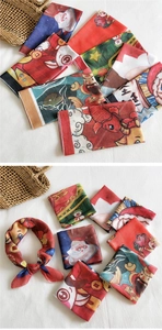 Detail view of cotton linen square scarves with Christmas and Chinese folk art prints