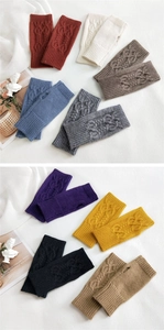 Detailed cable knit texture of women's fingerless gloves in nine various colors