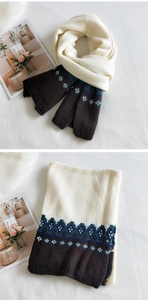 Detail of chunky knit scarf with vintage geometric pattern and contrasting color block