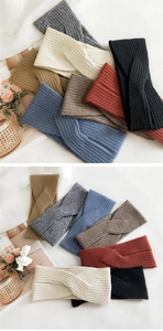Detail of twisted knit headbands in various colors with soft ribbed texture and elastic band