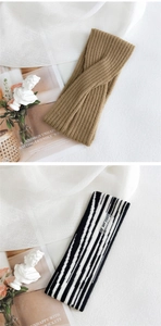 Detail of twisted knit camel headband and black white striped hair band with brand tag
