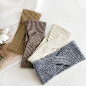 Knitted twist headband set in yellow, brown, white and grey with ribbed texture detail