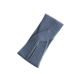 Elastic blue-grey knitted twist headband with ribbed texture for makeup and face wash