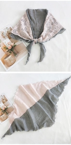 Detail of pink floral lace and grey linen stitching on a triangular scarf