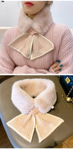 Detail of pink faux rabbit fur scarf with knitted bow tie design for a sweet style
