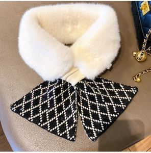 Detail of cross-knot scarf with beige faux fur and black-white checkered knit texture