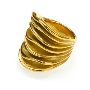 Modern wide gold layered ripple ring in stainless steel with a polished textured finish