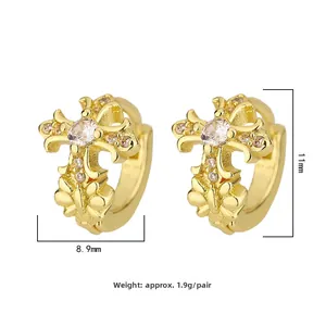 Detailed view of gold cross hoop earrings with inlaid zircons and dimensions 11mm x 8.9mm