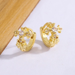 Exquisite gold cross hoop earrings with sparkling cubic zirconia and floral details