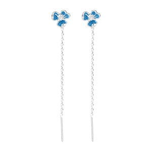 Detail of blue iris drop earrings featuring enamel petals and silver threader chain