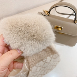 Winter beige knit crossover scarf featuring a premium faux fur pom-pom and diamond texture
