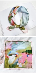 Gros plan d'un foulard carré en soie avec imprimé peinture à l'huile abstraite colorée
