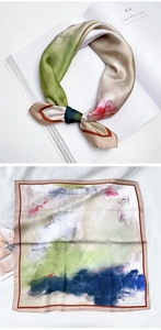 Vue détaillée d'un foulard en soie avec imprimé abstrait et bordure cousue marron