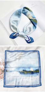 Détails à plat et noués d'un foulard en soie bleu clair avec motif de paysage à l'huile