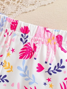 Girls summer shorts featuring vibrant floral heart print with an elastic waistband