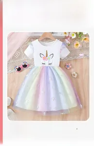 Detail of girls' unicorn rainbow mesh dress with colorful soft tulle and floral patterns